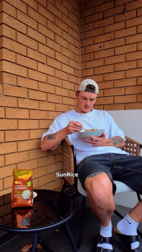 Instagram post by @tom.smallwood for SunRice. Caption reads: This Mexican rice salad, using @sunrice Indian....