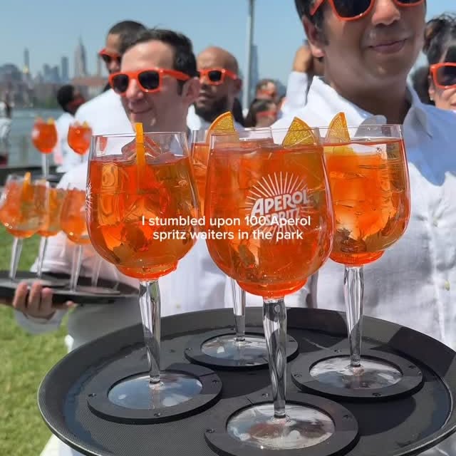 Instagram post by @thekatieromero for Aperol Spritz. Caption reads: Does anyone else know a more iconic pairing than....
