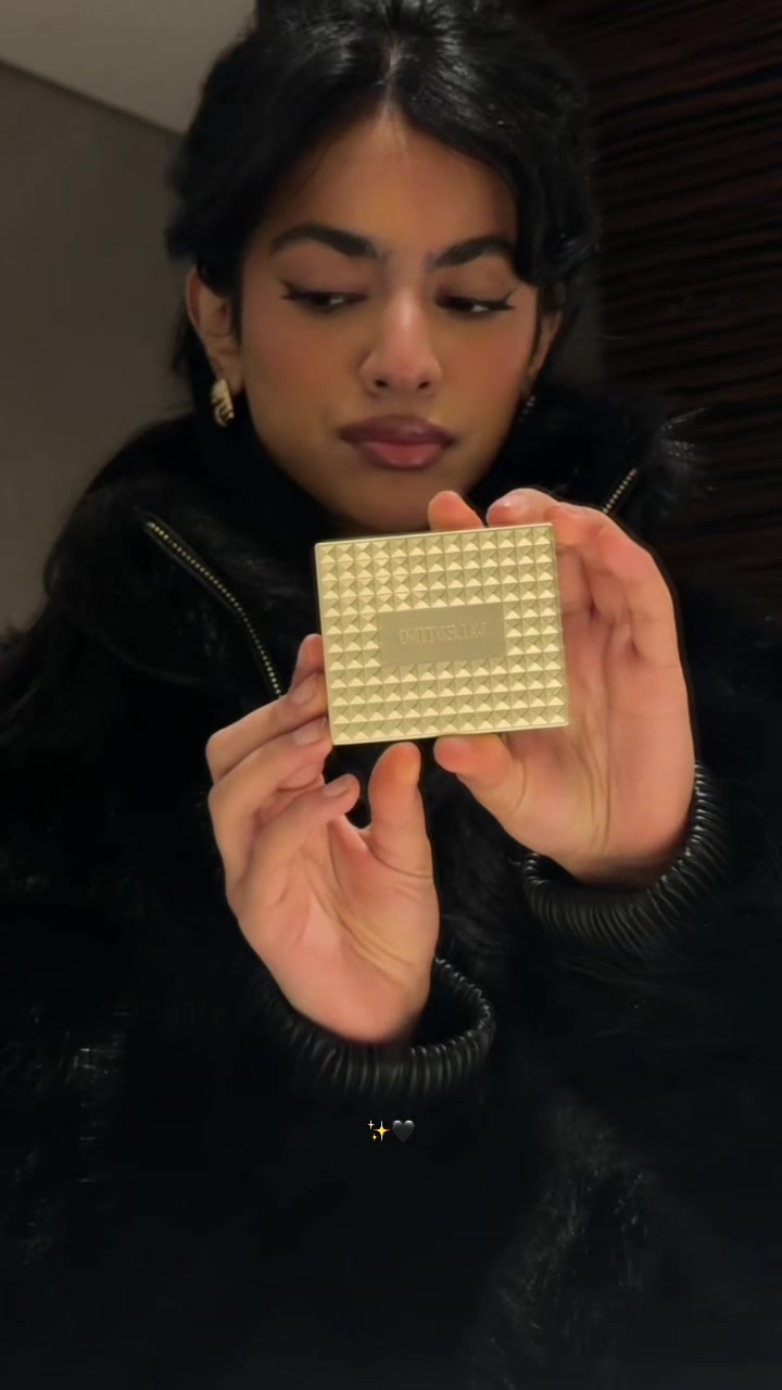 TikTok post by @daimgaw for Valentino. Caption reads: Valentino energy, all day ✨🖤 @Valentino  [...].