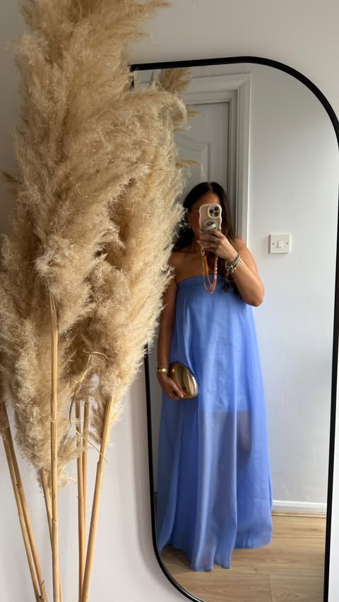 Instagram post by @laura.loves.belfast for ASOS. Caption reads: [...] open to invites just to wear it @stylink....