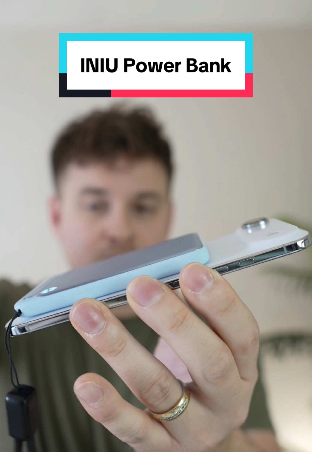 TikTok post by @kevinbreezetv for INIU. Caption reads: [...] power bank is packed full of features! #INIU....