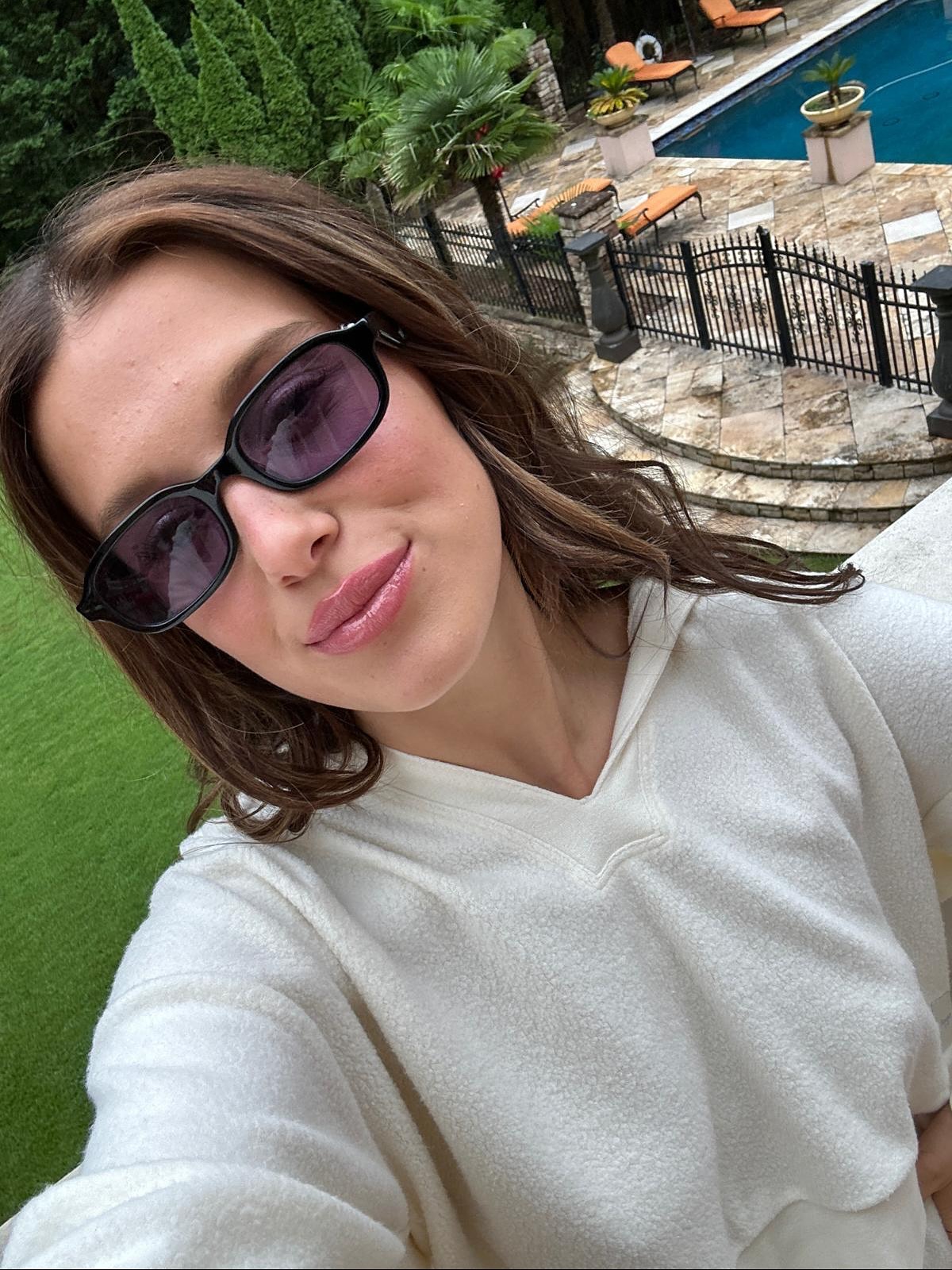 Instagram post by @milliebobbybrown for Nordstrom. Caption reads: Haven’t stopped wearing these sunnies lately - you....