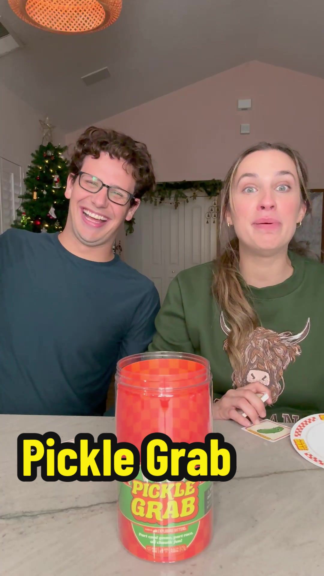 TikTok post by @michael.dicostanzo for Exploding Kittens. Caption reads: Who has the best reaction time?? (without grabbing....