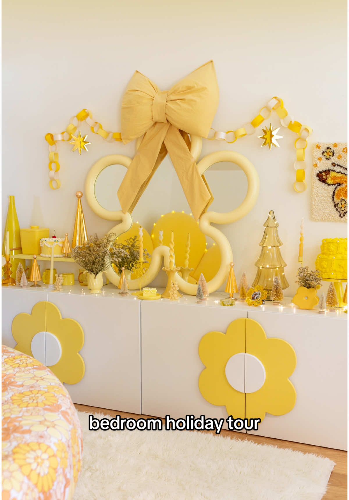 TikTok post by @aww.sam for Ruggable. Caption reads: An all yellow room 🤝 yellow holiday decor. This....