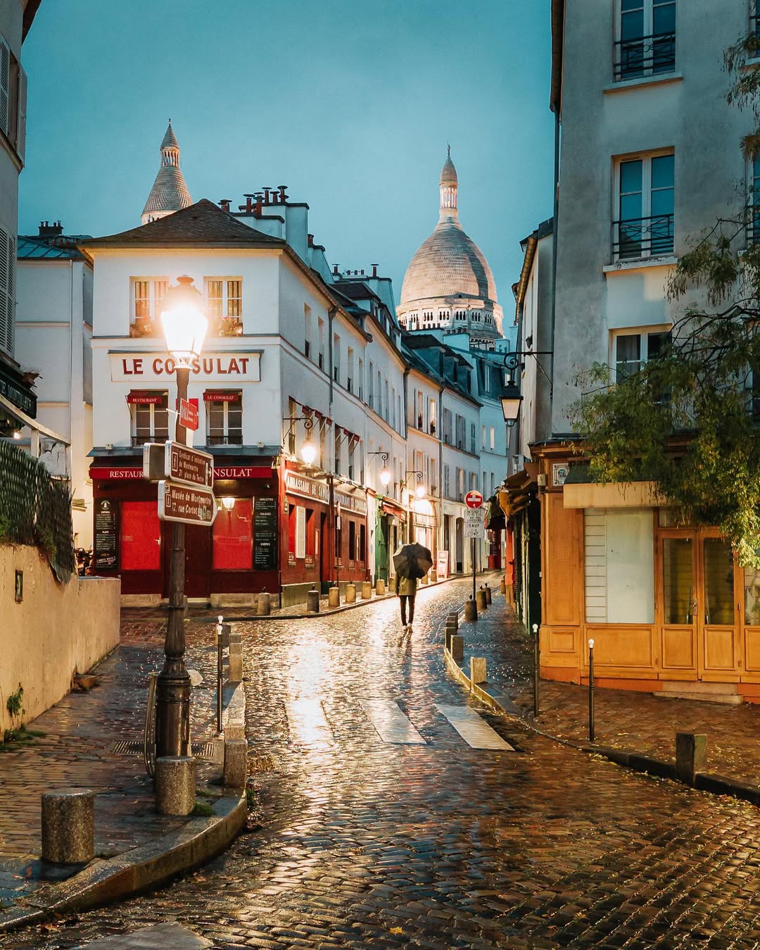 Instagram post by @wonguy974 for Passion Passport. Caption reads: RAINY DUSK IN MONTMARTRE ☔️
🇺🇸 Lately, I have....