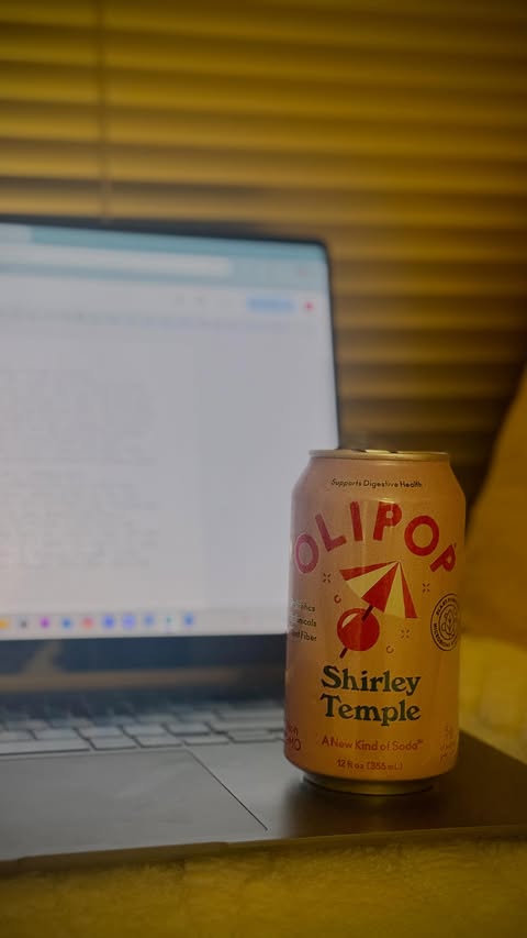 Instagram post by @leonni.griffin for 98Strong. Caption reads: [...] @target #olipoppartner @drinkolipop....