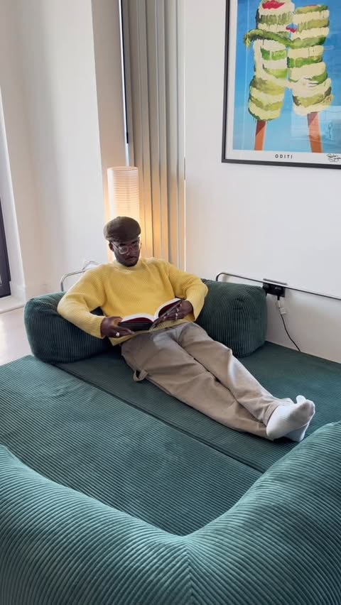 Instagram post by @dairematiluko for OMHU. Caption reads: [...] down after work with my new sofa from....