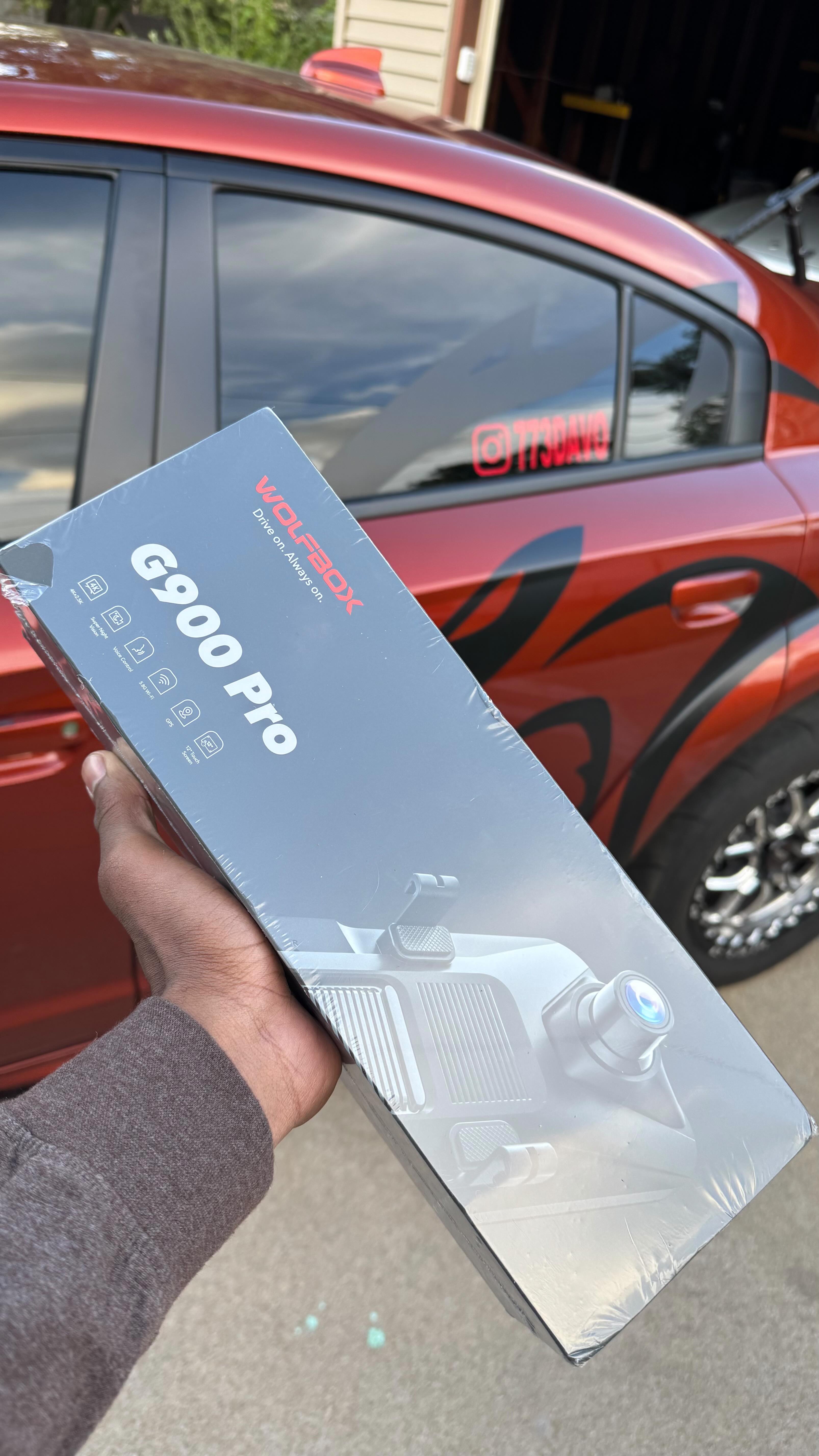 Instagram post by @773davo for WOLFBOX. Caption reads: WOLFBOX G900 4K+2.5K Touch Screen Parking [...].