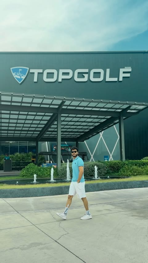 Instagram post by @theyashibaba for Topgolf. Caption reads: Just out here enjoying the vibe at Topgolf....