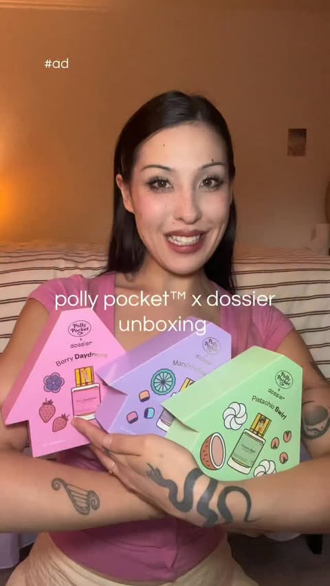 Instagram post by @cammyreviews for Dossier. Caption reads: New cuteness from @dossierperfumes x @pollypocket....