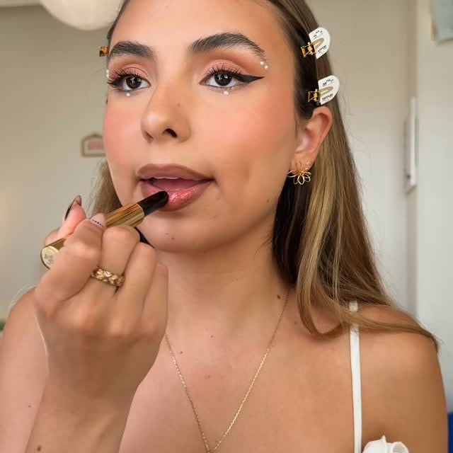 Instagram post by @mckennasalazar for Sally Hansen. Caption reads: the cutest festival inspired nails from....