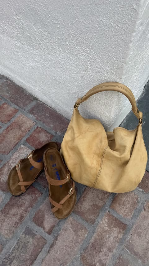 Instagram post by @faithhelizabethh for Birkenstock. Caption reads: [...] yourself on a spring solo date🧋🌸🎧....