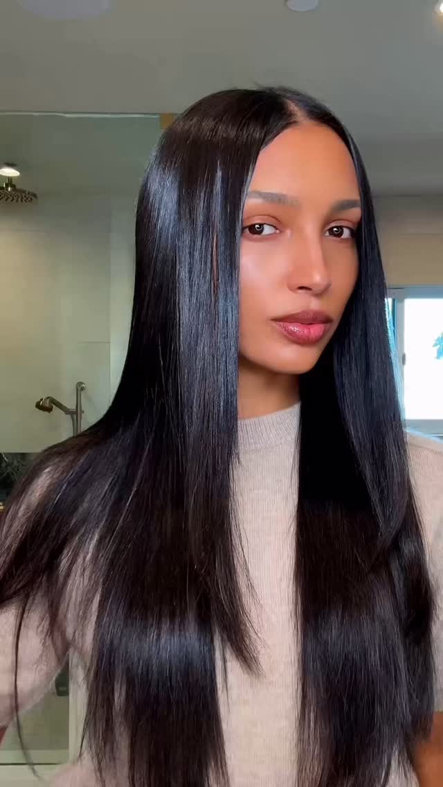 Instagram post by @jastookes for living proof. Caption reads: Experience the ultimate in smooth, frizz-free hair....