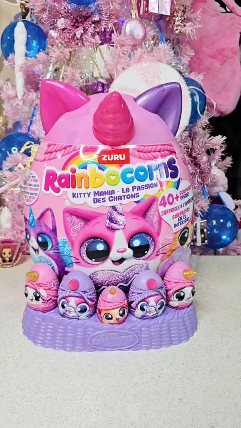 Instagram post by @tanjastoysreview for ZURU Toys. Caption reads: [AD] 🙀Unboxing Rainbocorns Kitty Mania😻
40+....