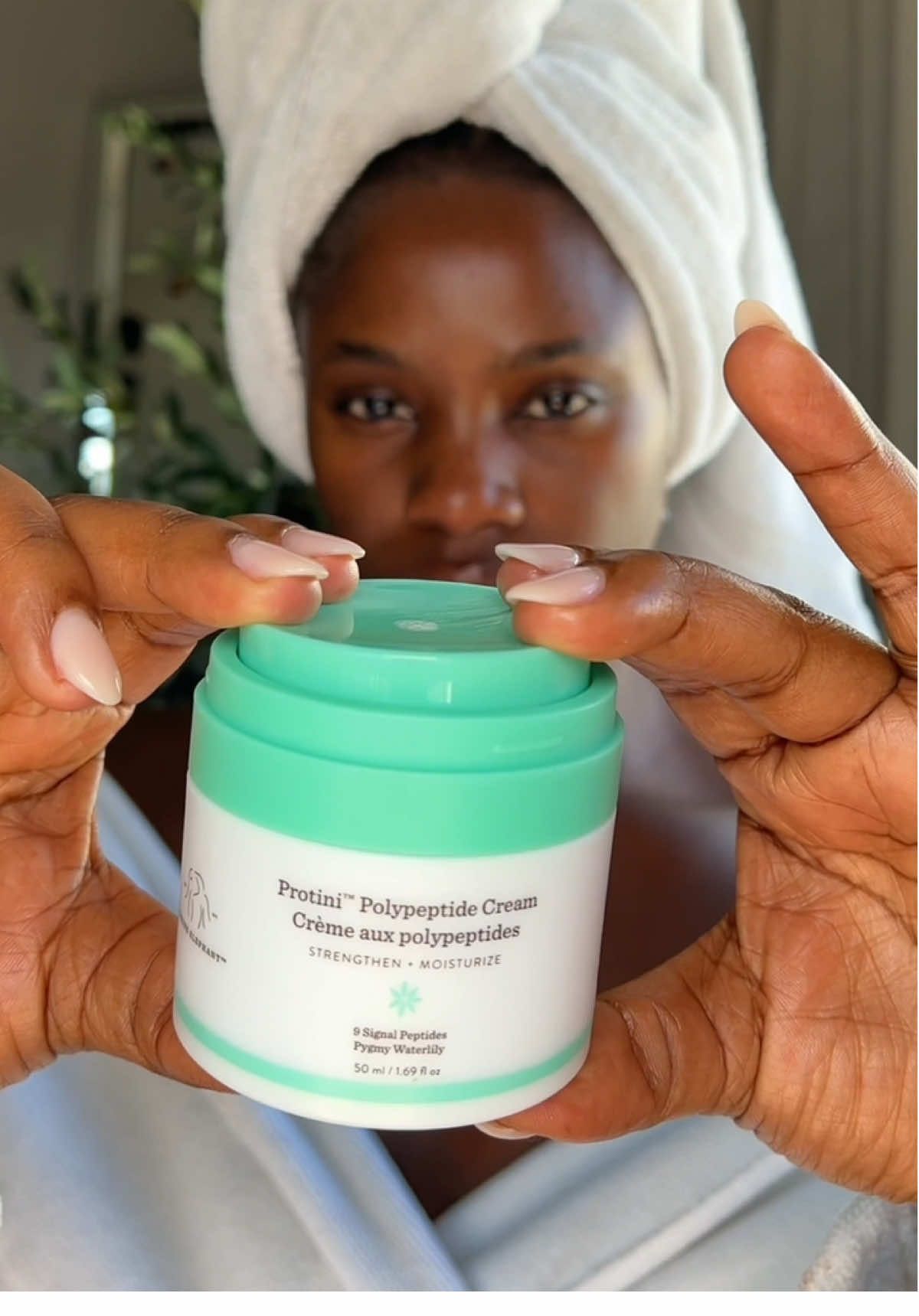 TikTok post by @hindirlane for Drunk Elephant. Caption reads:  #DrunkElephantPartner Be honest… would you trust....