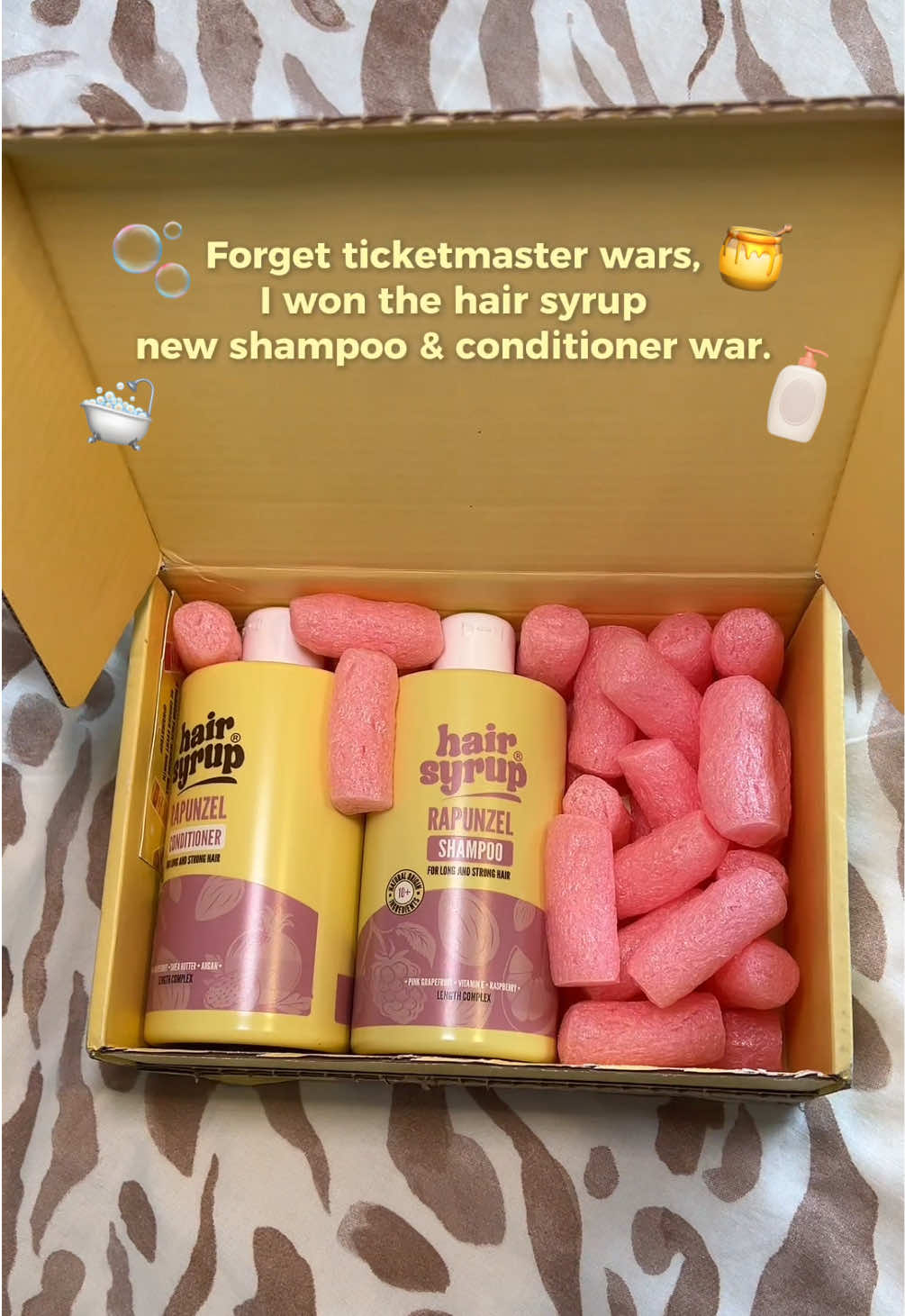 TikTok post by @jessoliviaaaa for Hair Syrup. Caption reads: Rapunzel hair INCOMING. 🍯🛁🫧🧴💛🩷 @hairsyrup....