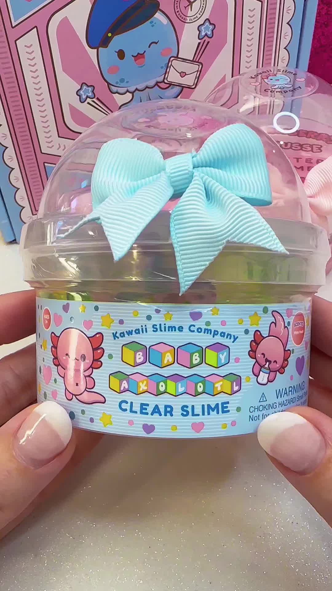 TikTok post by @vivizoneunboxed for Kawaii Slime Company. Caption reads: Baby Axolotl Clear Slime @Kawaii Slime Company . I....