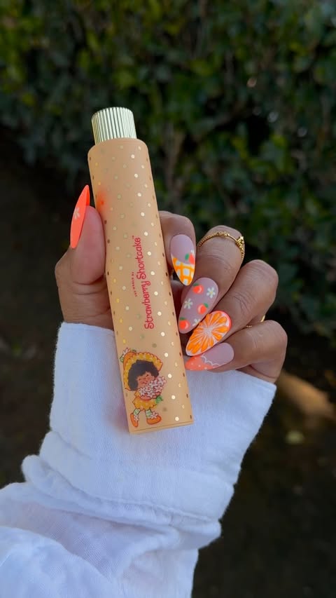 Instagram post by @nailartbyjen for Scentbird. Caption reads: [...] spirit. 🍊🎨✨ Strawberry Shortcake x....