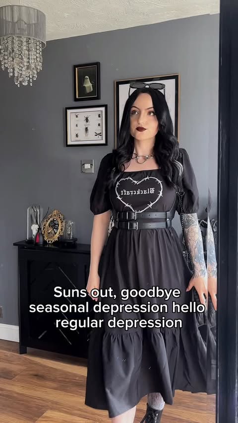 Instagram post by @catarinaxjane for Blackcraft Cult. Caption reads: [...] a crumb of serotonin Dress & bag:....