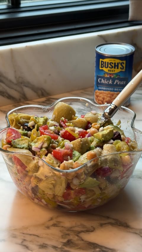 Instagram post by @brookemason for Bush's Beans. Caption reads: #BushsBeansPartner the summer salad that I’m [...].