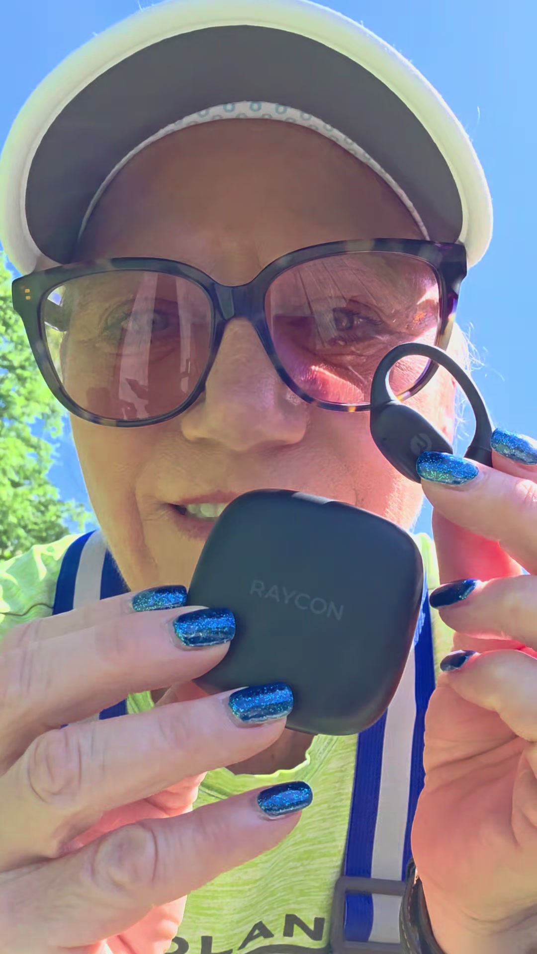 TikTok post by @chelly_sands for Raycon. Caption reads: [...] #wirelessearbuds #fitnessearbuds....