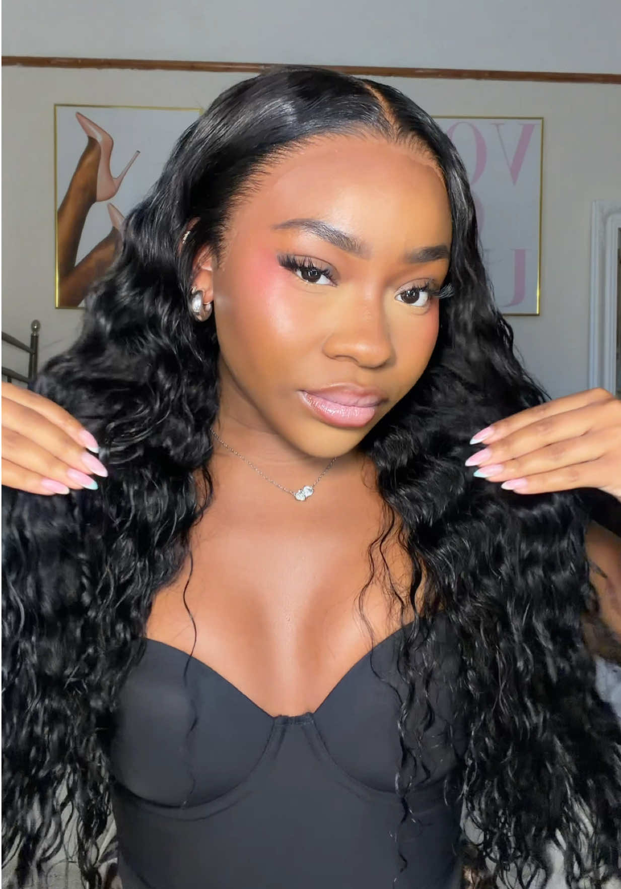 TikTok post by @marisajennb for Wiggins Hair. Caption reads: these curls are so lush!✨🥰@wigginshairwig....