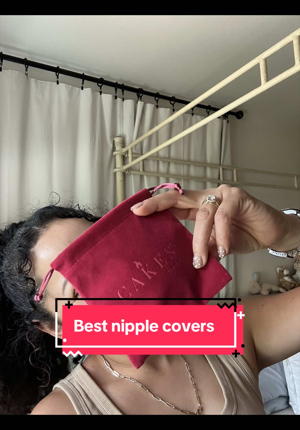 TikTok post by @glowtita for CAKES body. Caption reads: @CAKES Body #nipplecover #cakesbody [...].
