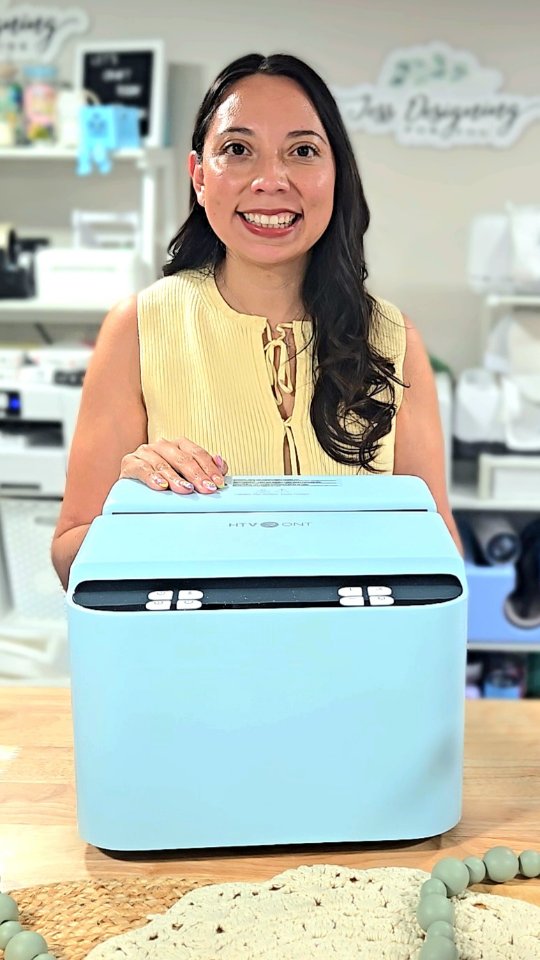 Instagram post by @jessdesigningforyou for HTVRONT. Caption reads: Meet the brand new A200 Auto Tumbler Heat Press....