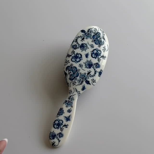 Instagram post by @blushandbloomskin for Rock & Ruddle. Caption reads: Meet my new hairbrush — she’s cute, she’s gentle....