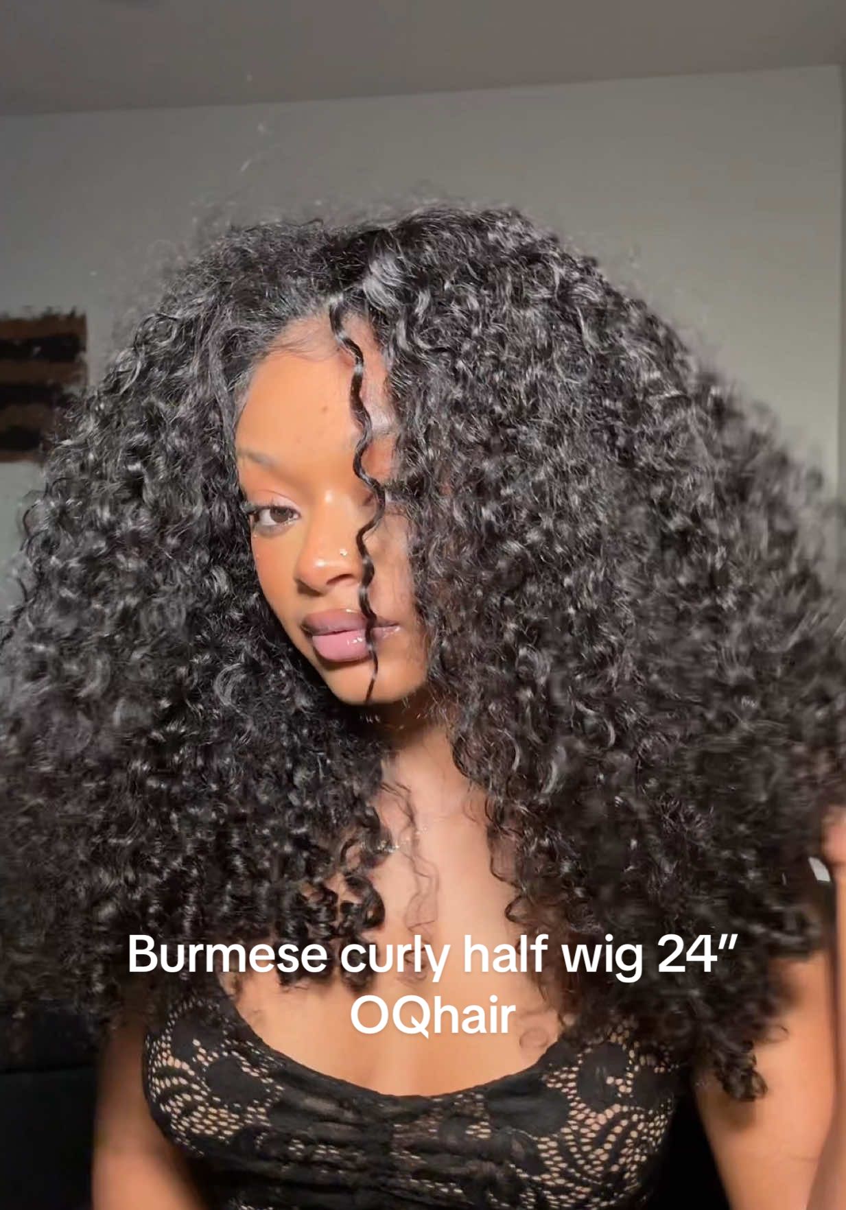 TikTok post by @easybreezayy for OQHAIR. Caption reads: Multiple styles using  my half wig from....
