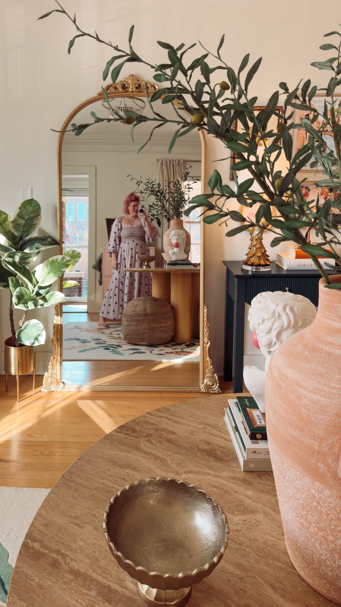 Instagram post by @emilywelchstyle for Homegoods. Caption reads: I’d even take a good room rearrange! 

#ad my....