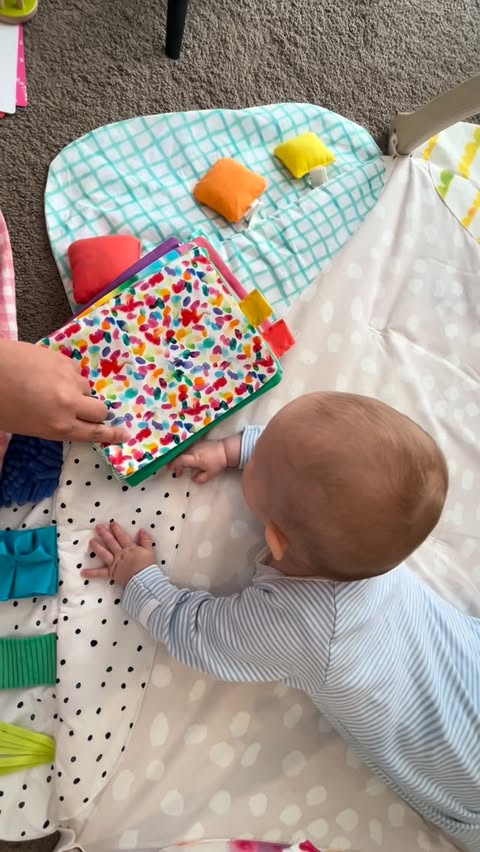 Instagram post by @_teacherpolly for Lovevery. Caption reads: [...] our 3-4 month The Charmer playkit from....
