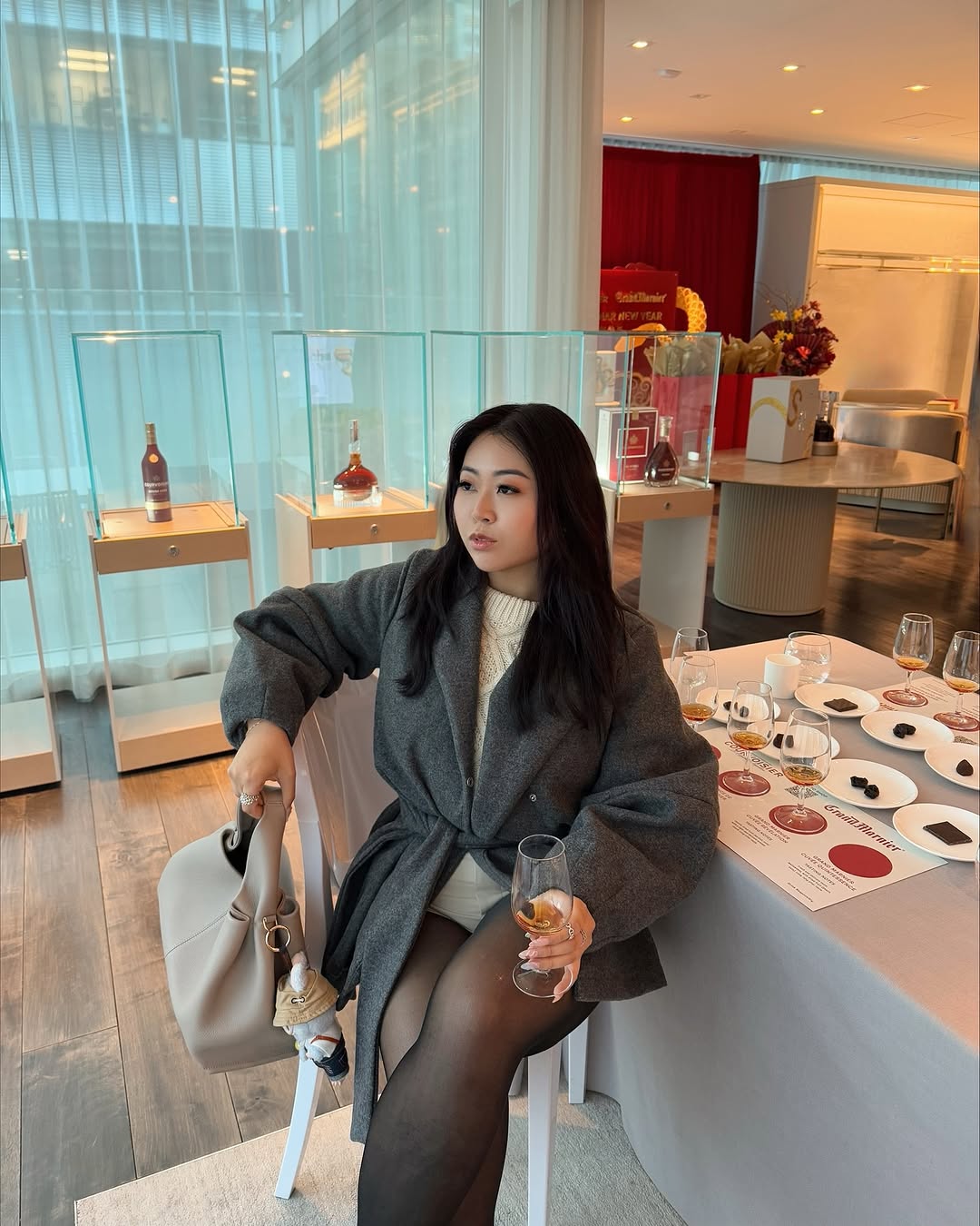 Instagram post by @charmynchan for Grand Marnier. Caption reads: Hydrated & happy @grandmarnierofficial for Lunar....