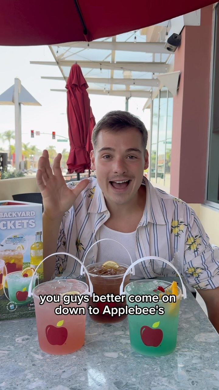 Instagram post by @elliottnorris for Applebee's. Caption reads: Guess I’m spending a good chunk of my summer at....