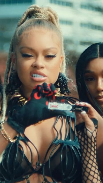 Instagram post by @latto for Ledger. Caption reads: INVEST IN ME LIKE CRYPTO W/....