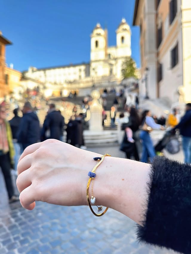 Instagram post by @glowwithmelove for Orelia. Caption reads: [...] the iconic Spanish Steps, wearing my....
