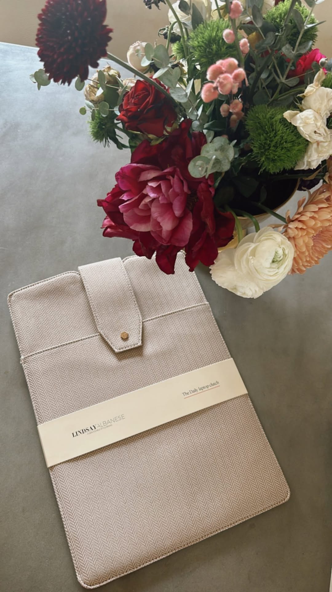 Instagram post by @lindsayalbanese for FabFitFun. Caption reads: Woohoo! I designed my laptop clutch exclusively....