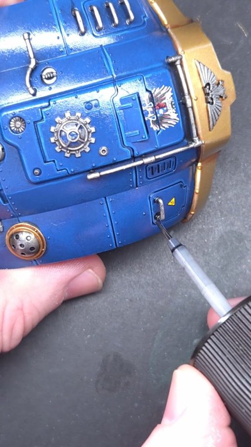 Instagram post by @thepaintingcoach for AK-Interactive. Caption reads: [...] and shade your models using....