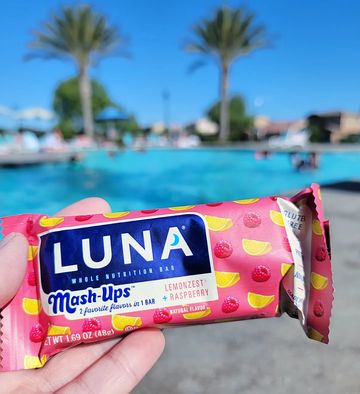 Instagram post by @travel.play.eat.repeat for LUNA Bar. Caption reads: #ad🍋 Loving the new @LUNABar Mash-Ups! LUNA Bar....