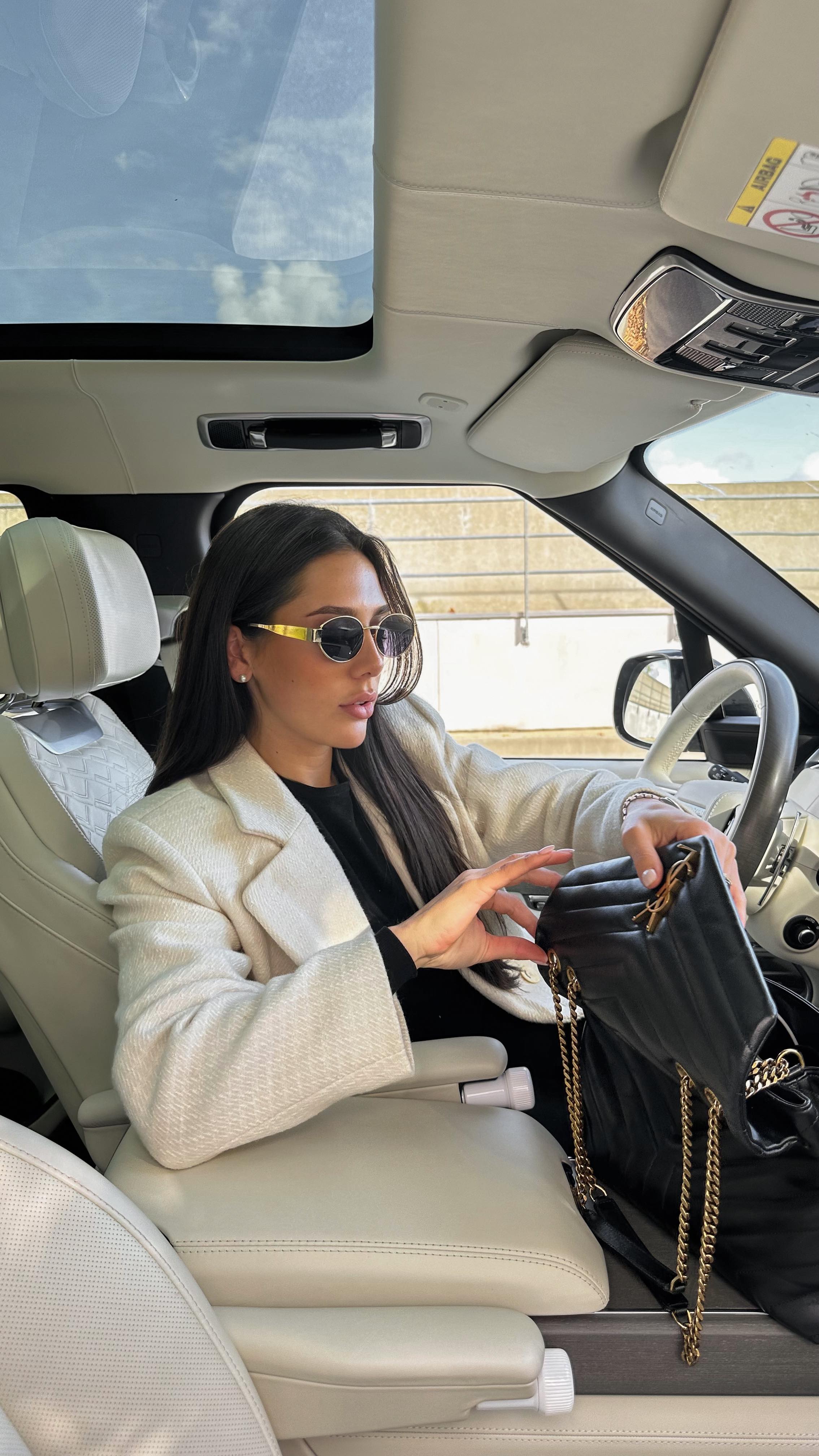 Instagram post by @helena.bu for Land Rover. Caption reads: The @rangerover car matches the vibe of my outfits....