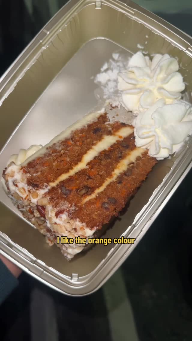 Instagram post by @hungry4munchies for The Cheesecake Factory. Caption reads: Trying Carrot Cake from @cheesecakefactory.