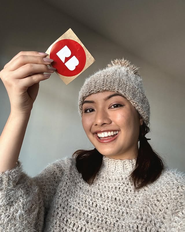 Instagram post by @romycollado for Redbubble. Caption reads: [...] presents this year! Thank you to @redbubble....