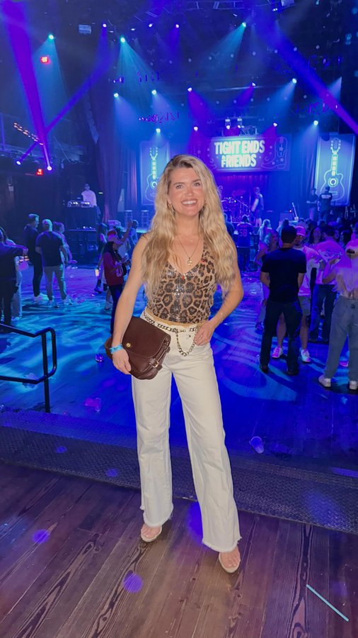 Instagram post by @ariaadare for Flag & Anthem. Caption reads: TAYLOR SWIFT showed up to perform with KANE BROWN....