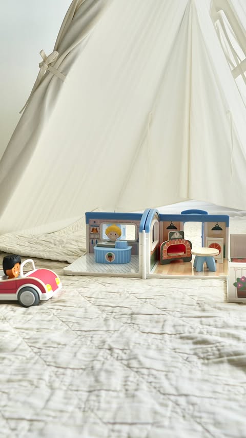 Instagram post by @charlieandcrewmama for Melissa & Doug. Caption reads: #AD 🚗✨Little details, big imaginations! Watching....