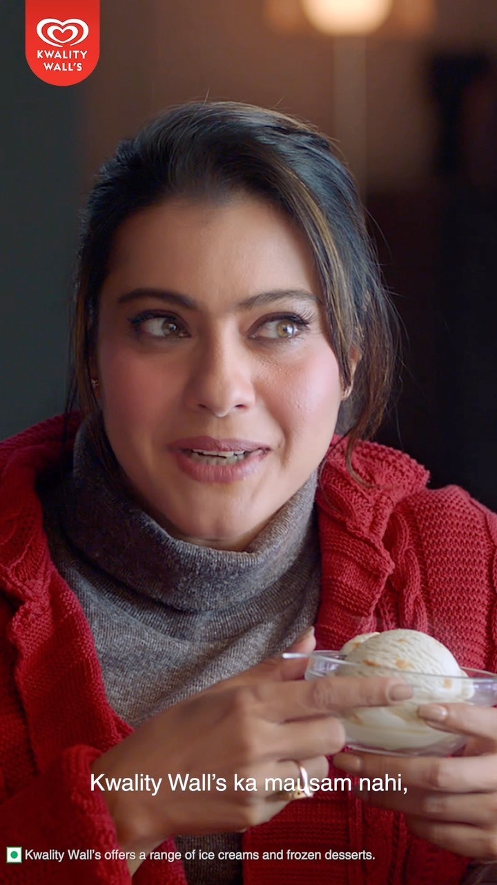 Instagram post by @kajol for Kwality Wall's. Caption reads: Kaun kehta hai ki thand me ice-cream nahi....