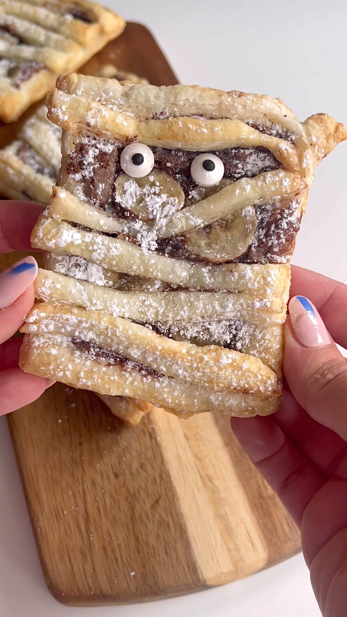 Instagram post by @ashleylamego for Nutella. Caption reads: Nutella Mummy Pies ✨

1 puff pastry sheet 
Nutella....