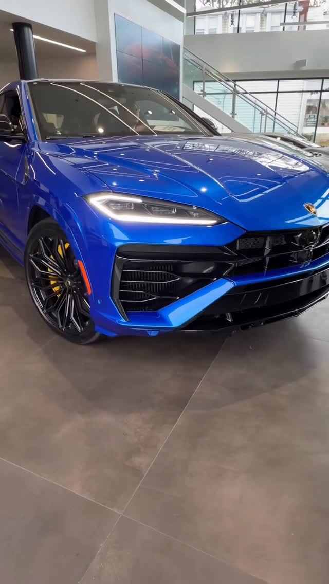 Instagram post by @lambogreenwich for Lamborghini. Caption reads: [...] with a test drive of the new Lamborghini....