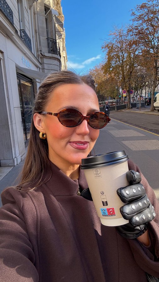 Instagram post by @sofynicoledobson for Sweaty Betty. Caption reads: The coat REALLY is about to replace every single....