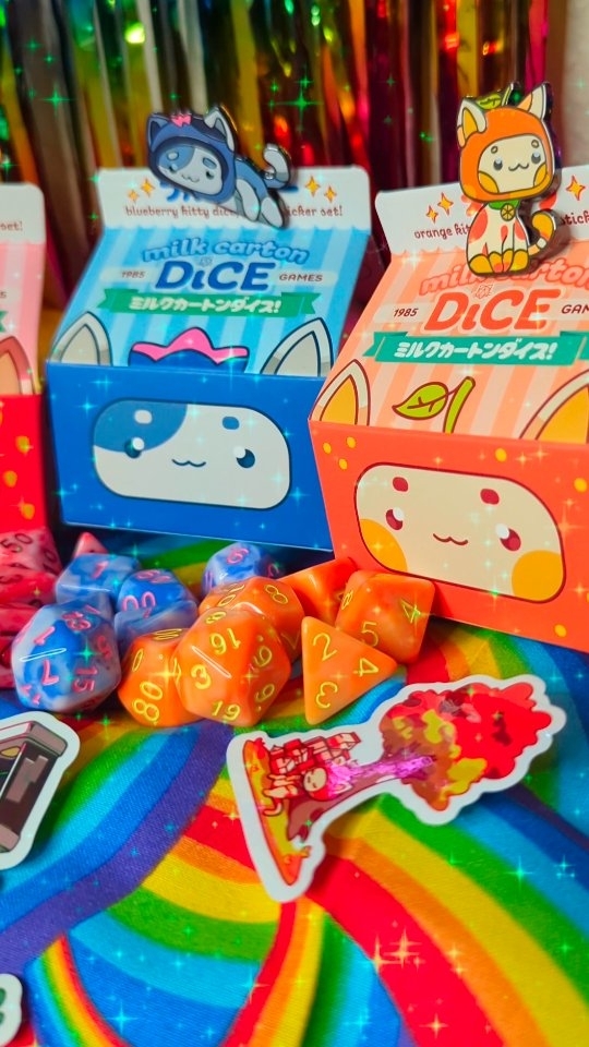 Instagram post by @glopop.exe for 1985 Games. Caption reads: [...] DICE!! Which one is your fav?? 🌈😻✨💕....