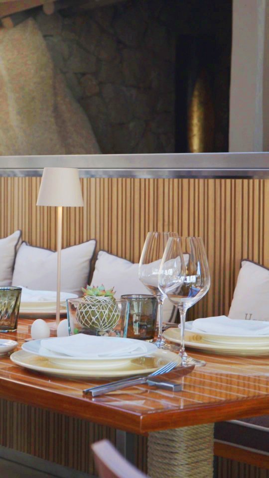 Instagram post by @phibeachofficial for Herno. Caption reads: An unparalleled experience of taste and....